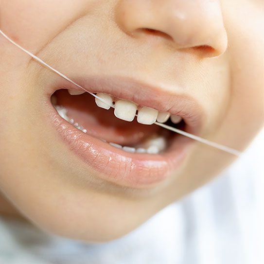 Teaching children to floss
